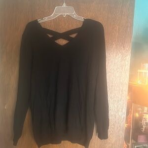 Black XL sweater with criss cross pattern  in back.  Brand love Ellie